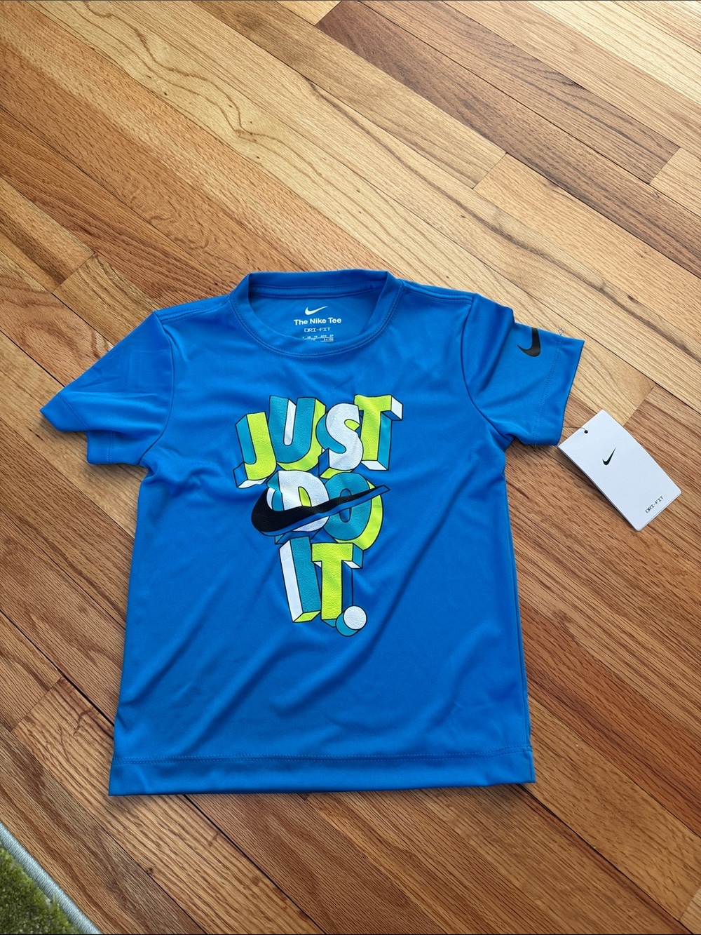 Nike Blue Short Sleeve Tee with Neon 'Just Do It' Graphic